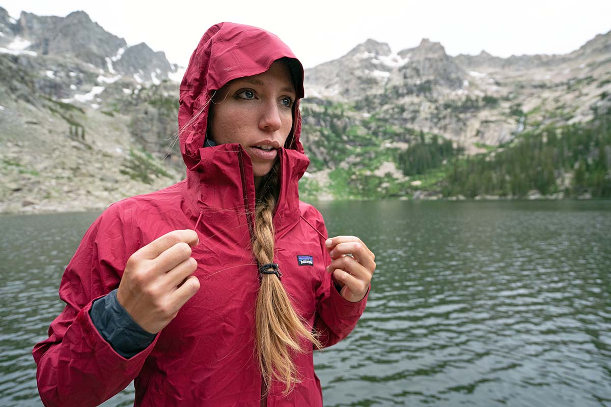 Adjusting the hood on Patagonia Rainshadow rain jacket